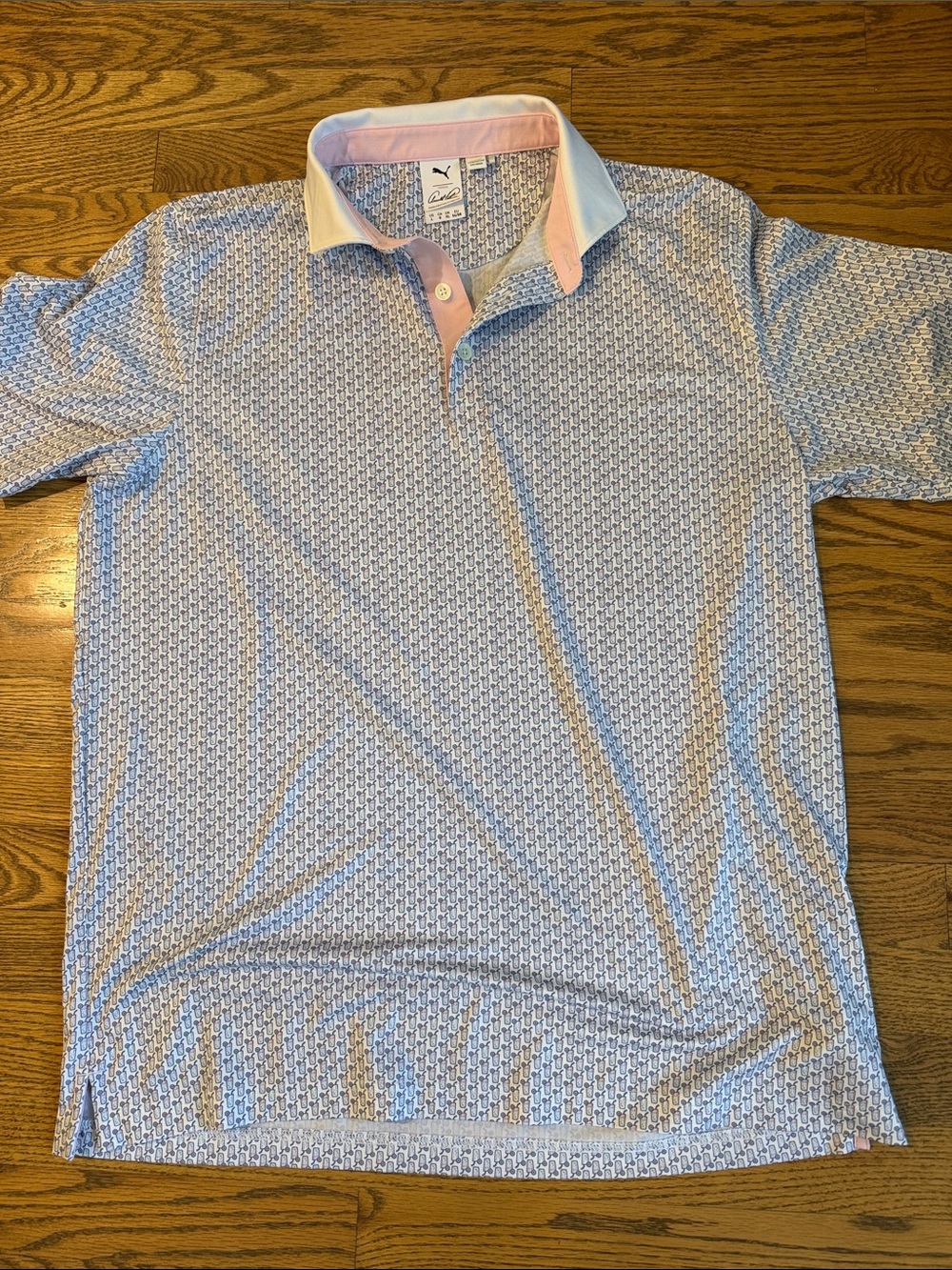 Puma Men’s Blue Geometric Print Polo with Pink Contrast Collar